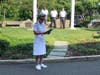 Sueann Schorr speaks during a traditional Flag Day ceremony held outside Town Hall on Monday.