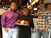 (L to R) Owner Casey Dohme, Chef Silbino Perdomo and Owner Matt Bacco display their wings at The Blind Rhino in Norwalk.