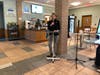 First Selectman Monica McNally speaks during the grand opening of The Café at Darien Librar​y on Wednesday.