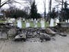 The damaged stone wall alongside St. Paul's on the Green Episcopal church's historic cemetery on East Avenue in Norwalk on Sunday, April 3, 2022.
