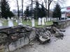 The damaged stone wall alongside St. Paul's on the Green Episcopal church's historic cemetery on East Avenue in Norwalk on Sunday, April 3, 2022.