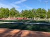 Athletes and musicians take the field during a lacrosse game at Shelton High School honoring the life of Jimmy McGrath, 17, a Fairfield Prep student who was fatally stabbed late Saturday.