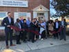 Federal, state and local leaders celebrate the grand opening of Norwalk's new business development center Thursday.