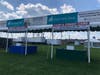 An entrance to the Norwalk Oyster Festival, scheduled to take place Sept. 8-10, set up Wednesday afternoon at Veterans Memorial Park and Marina.