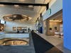 A new Starbucks coffee shop recently opened on the third level of the SoNo Collection shopping mall, near the Nordstrom department store.