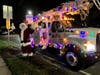 Santa arrives at the Third Taxing District's annual holiday tree lighting event Monday night in East Norwalk.