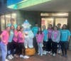 The staff at Sweet Ashley's Handcrafted Ice Cream, located at 248 East Avenue in Norwalk, pose with their new bear mascot, Ashley.