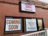 Signs advertising a new Pappas Pizza location "coming soon" at 14 Belden Avenue in Norwalk on April 23, 2026.