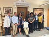 Ralph Bloom along with city, state and library officials during a history room dedication ceremony at the Norwalk Public Library on June 9, 2026.