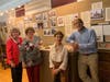 Volunteer Chris Varner, Board Member Eileen Rosner, volunteer, and executive director Tom Zoubek