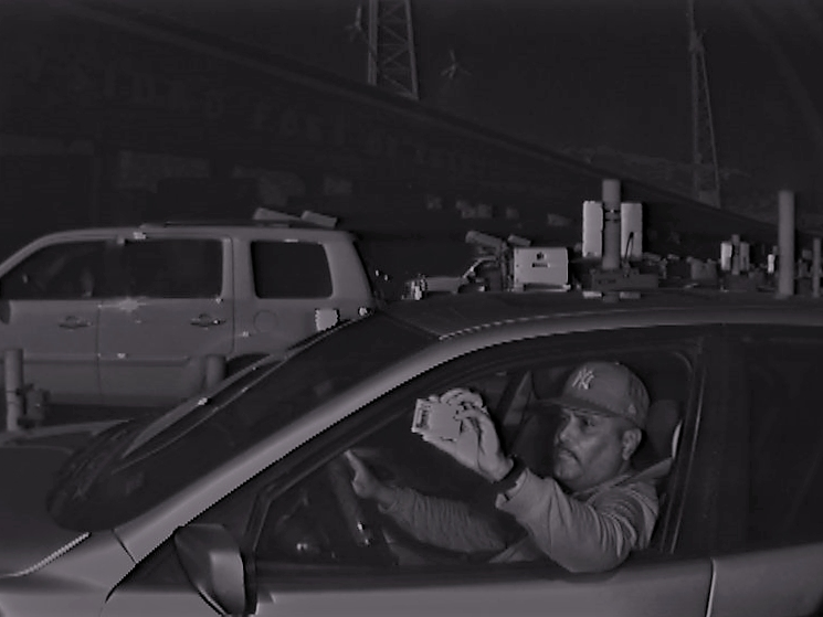 Neil Edwin Valera, a 50-year-old U.S. citizen who lives in Tijuana and is from El Paso, Texas, is accused of bringing the migrants through the San Ysidro Port of Entry in the trunk of his 1999 BMW.