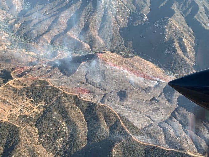 A fast-moving wildfire that burned around 200 acres of brush near Sycuan Casino is now 21% contained, fire officials said Wednesday.