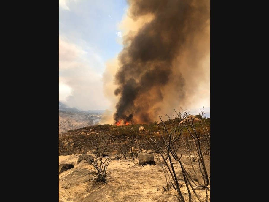 The Valley Fire has blackened thousands of acres and destroyed several dozen homes and outbuildings in rural eastern San Diego County.