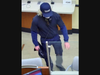 The suspect was described as a thin, roughly 5-foot-9-inch white man in dark blue pants, a blue short-sleeve shirt with a blue long-sleeve shirt underneath it, a navy-blue baseball cap, dark-colored shoes and a blond wig.