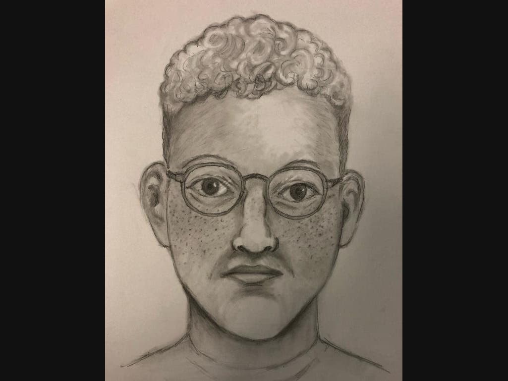 The suspect was described as a white man who is between 29 and 30 years old with short, curly red hair, freckles and crooked teeth. He was last seen wearing reading glasses and is clean shaven.