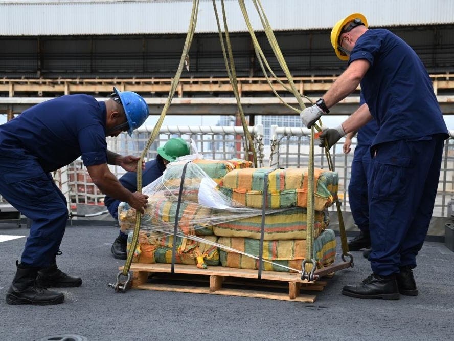 The Coast Guard Cutter Kimball (WMSL-756) crew offloads about 11,300 pounds of cocaine and roughly 4,000 pounds of marijuana worth more than $223 million on March 31, 2022, in San Diego.