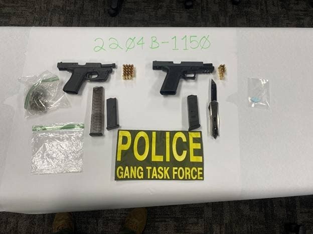 Deputies found two loaded semi-automatic handguns, an illegal switchblade and illegal narcotics in the home, sheriff's official said.