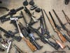 Authorities recovered firearms, brass knuckles, illegal batons, a firearm silencer and more than 45 grams of methamphetamine, according to the San Diego County Sheriff's Department.