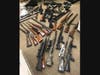 Authorities recovered firearms, brass knuckles, illegal batons, a firearm silencer and more than 45 grams of methamphetamine, according to the San Diego County Sheriff's Department.