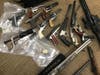 Authorities recovered firearms, brass knuckles, illegal batons, a firearm silencer and more than 45 grams of methamphetamine, according to the San Diego County Sheriff's Department.