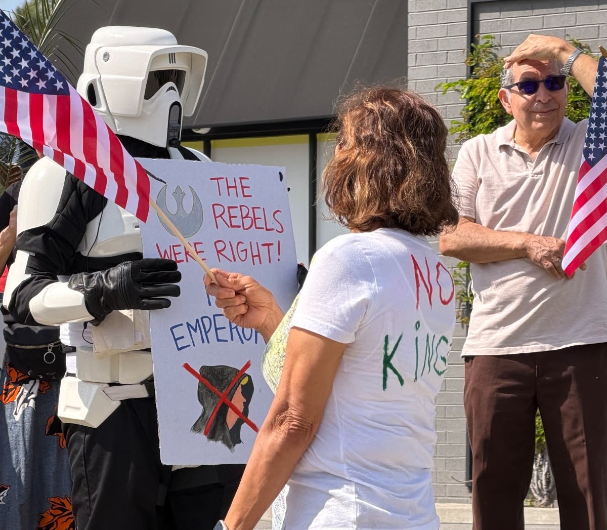 Protestors at a "No Kings" demonstration in Orange County.
