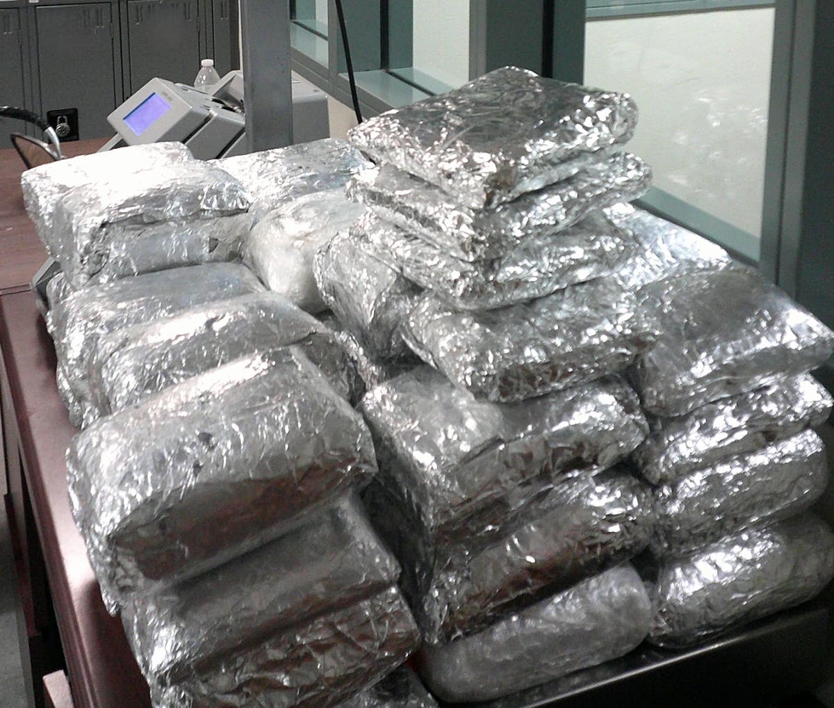 This picture shows 63 packages of methamphetamine weighing approximately 119.79 pounds, officials said.