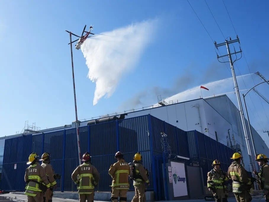 Crews work a warehouse fire in the Boyle Heights section of Los Angeles on Wednesday, June 17, 2026.