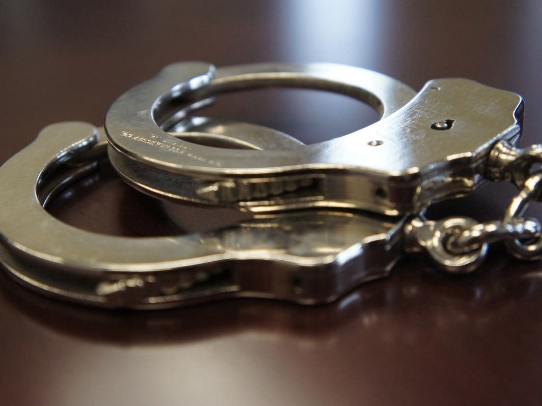 Police conducted a building search and arrested a man on suspicion of trespassing.