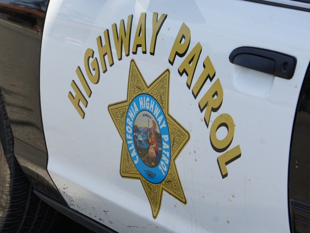 A witness told the CHP a white Jeep overturned, landing on its roof, and trapping two people inside.