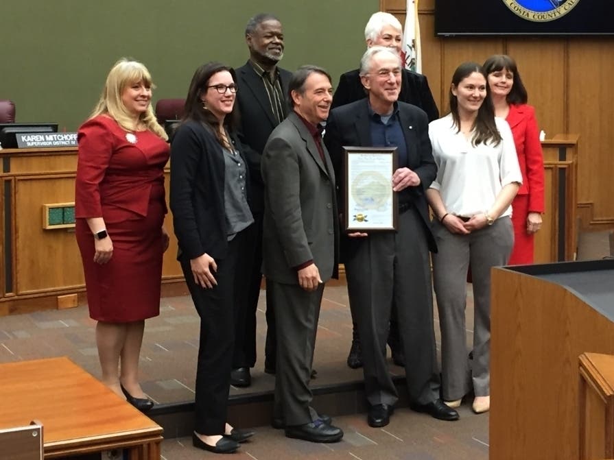 Larry Sly being honored Tuesday by the Contra Costa  County Board of Supervisors in Martinez.