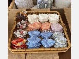 Hand-sewn masks ready for delivery.