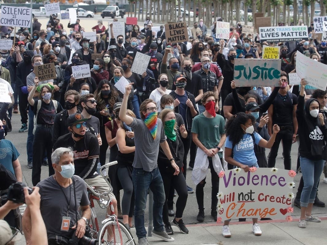Up to 6,000 people joined protests in San Francisco on Sunday, a day after looters trashed Union Square businesses.