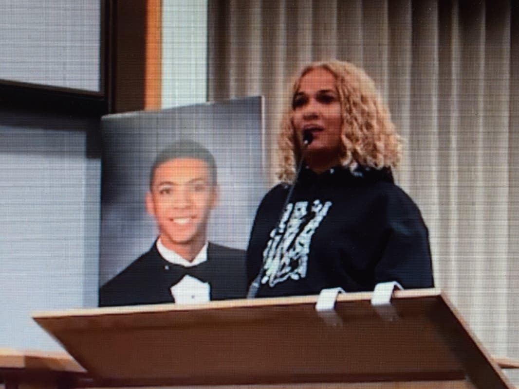 A screenshot from an earlier Walnut Creek City Council  meeting where Taun Hall held up a portrait photo of her son Miles Hall.