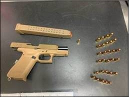 Police displayed the weapon seized during the arrest of a Fremont man.