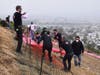 Volunteers install the 26th annual Pink Triangle on Twin Peaks in San Francisco on May 29, 2021. The triangle was illuminated nightly in June 2022 for Pride Month.