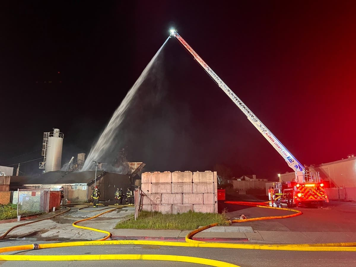 Firefighters used a ladder truck to attack the flames.