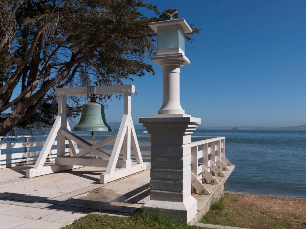 The bell at Angel Island Immigration Station in May 2013, The island in San Francisco Bay offers expansive views of the San Francisco skyline, the Marin County Headlands and Mount Tamalpais in California.