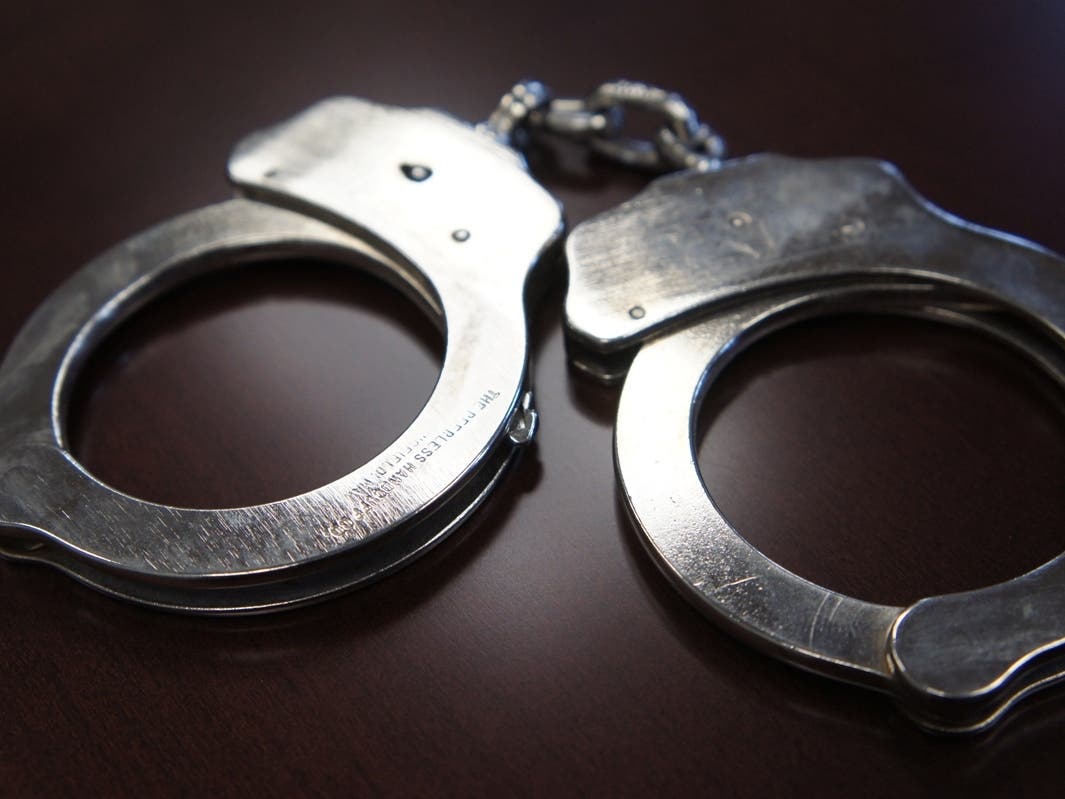 A firearm was allegedly found during the arrest.