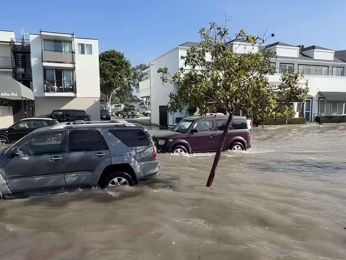 Flooding inundated the streets of Balboa Peninsula Friday, Oct. 9 in Newport Beach.