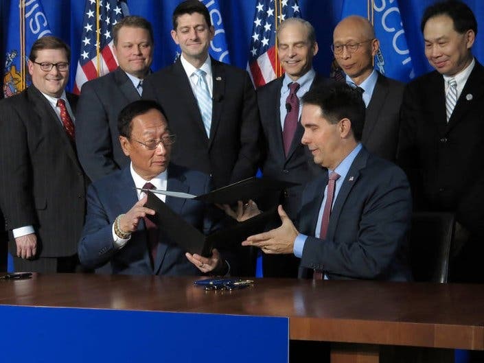 Foxconn Founder and CEO Terry Gou and former Gov. Scott Walker sign the deal in Racine.