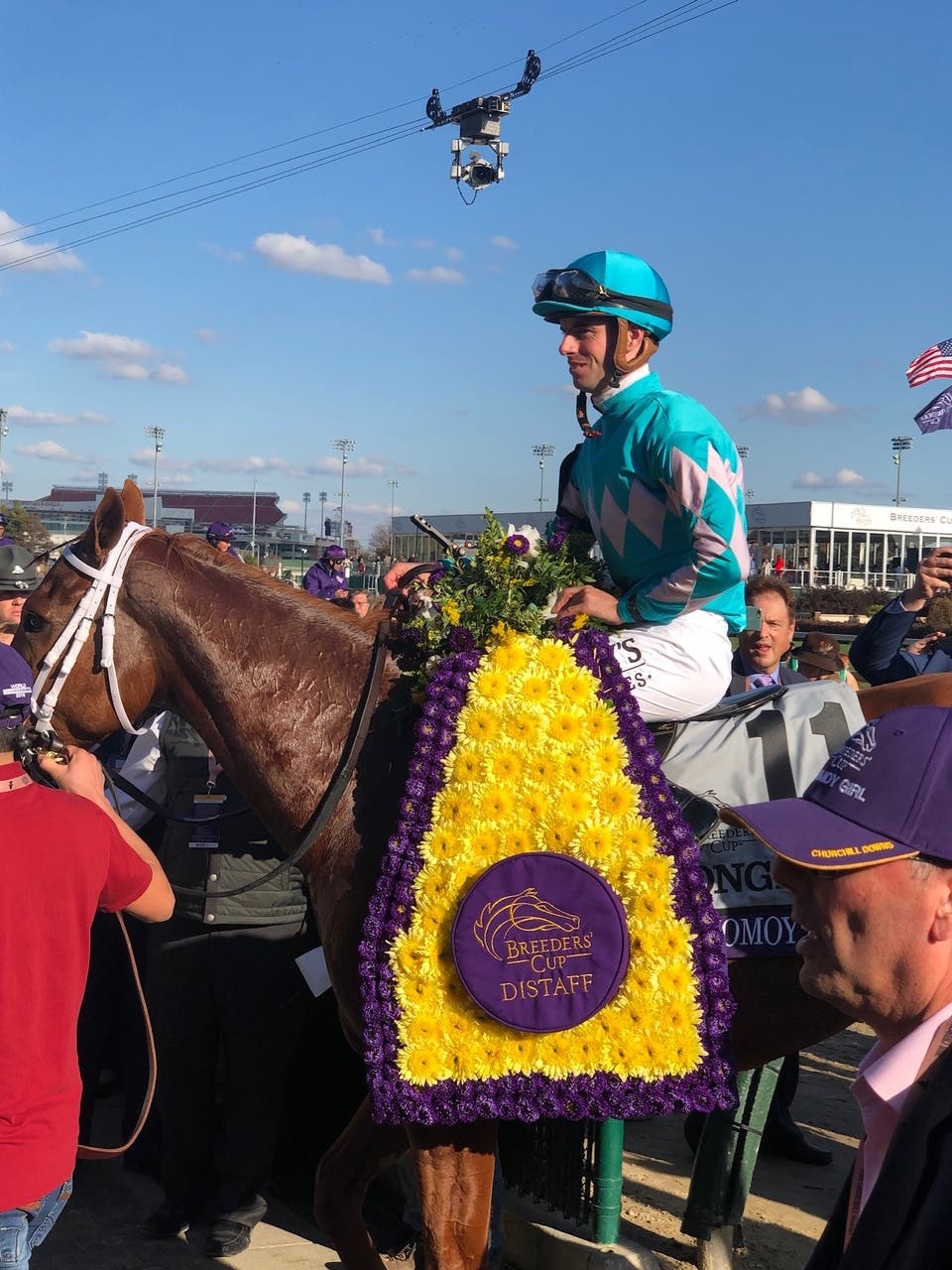 Monomoy Girl and Jockey Florent Geroux in the winner’s circle at Churchill Downs, with owner Stuart Grant standing by. 