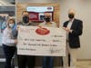 WSSC Members Receiving Donation from Wakefield Co-Op