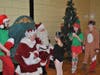 Volunteers at the North Suburban YMCA’s Holiday Giveback enjoyed visits with Santa and Mrs. Claus, along with holiday treats and activities.