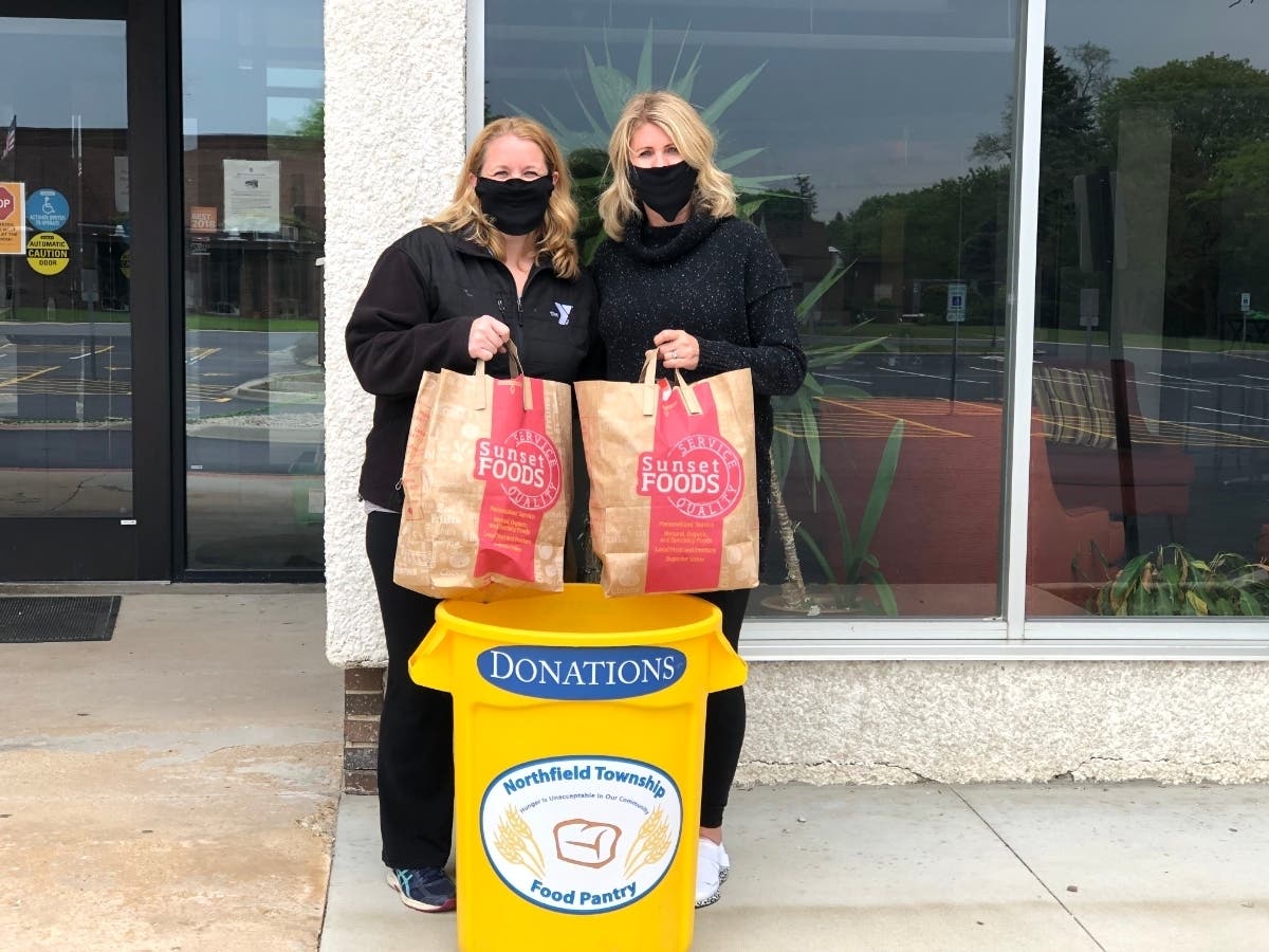 North Suburban YMCA has added a yellow drop off bin outside its front entrance to collect food for those in the community in need.