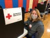 The North Suburban YMCA has helped the American Red Cross with its blood supply shortage by hosting several blood drives throughout the year.  Shown here is NSYMCA’s CEO, Kathy Fielding giving blood at the August drive. 
