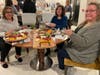 The Northbrook Woman’s Club event  “Learning Charcuterie” included (from left) Rosalie Lemperis, Anne Nugent, and Katie Lane

