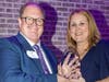 From Right to left:  Kathy Fielding, CEO of the NSYMCA awards A.C. Buehler the recipient for the 2023 Thiel Award for social responsibility and community leadership. 