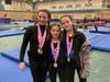 Caption: (from left to right) Amanda Fielding, Madelyn Elbaum and Victoria Arzumanov post awards at Leenda's Island Adventure meet representing the NSYMCA Gymnastics Team