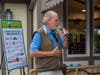 Caption:  Veteran Chicago radio host, John Howell from the John Howell Show on WLS-AM, auctions off Cubs Media seats to the over 135 golfers at the North Suburban YMCA Golf Fundraiser.