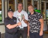 Caption: At the North Suburban YMCA’s Community Strong Golf Fundraiser winners of lowest scoring team show off their winning trophy. (from left) Howard Schultz, Ron Goldblatt and Chase Noonan (missing in photo Shawn Gordan).